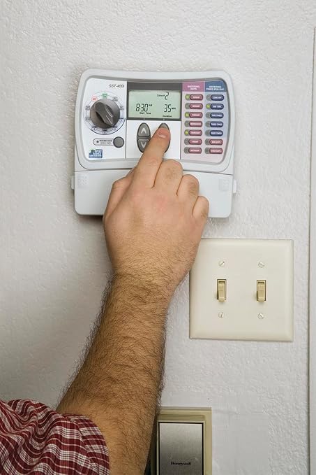 Rain Bird SST600IN Simple-To-Set Indoor Sprinkler/Irrigation System Timer/Controller, 6-Zone/Station (this New/Improved Model Replaces SST600I),Gray/Green